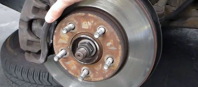 Someone holding wheel bearings